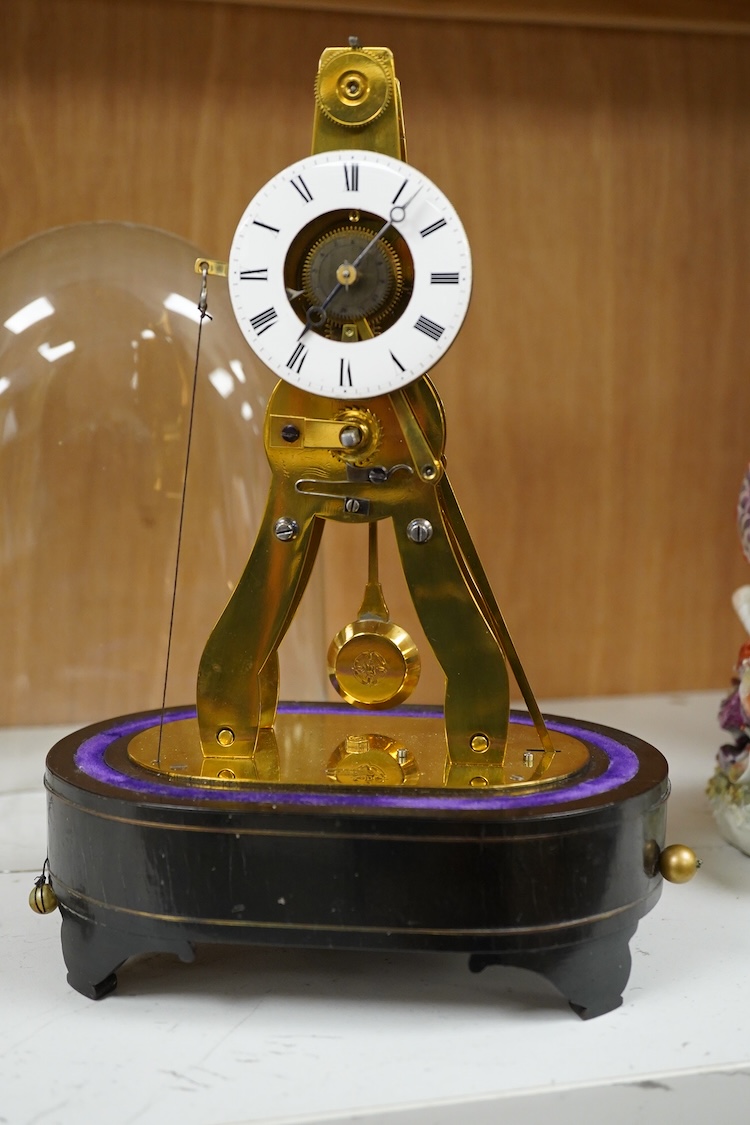 A late 19th century French eight day skeleton timepiece with alarm under glass dome, stamped 'Ms Honorables Exp. Paris Londres' with key